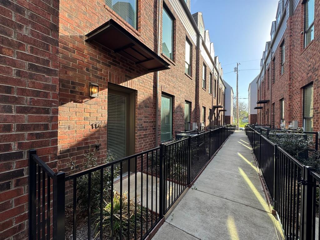 114 Chester Court Dallas, TX 75203 - Photo 31 of 31 a view of buildings from the balcony