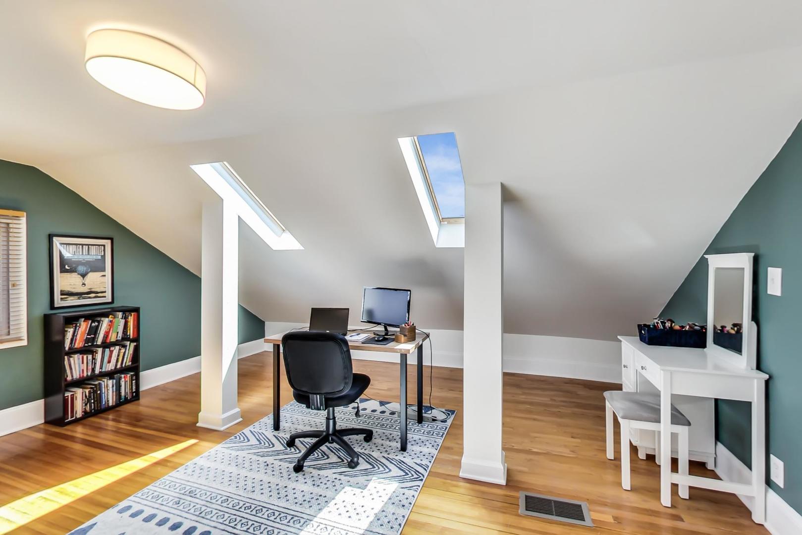 272 North Willow Road Elmhurst, IL 60126 - Photo 20 of 33 a view of a livingroom with workspace and a window