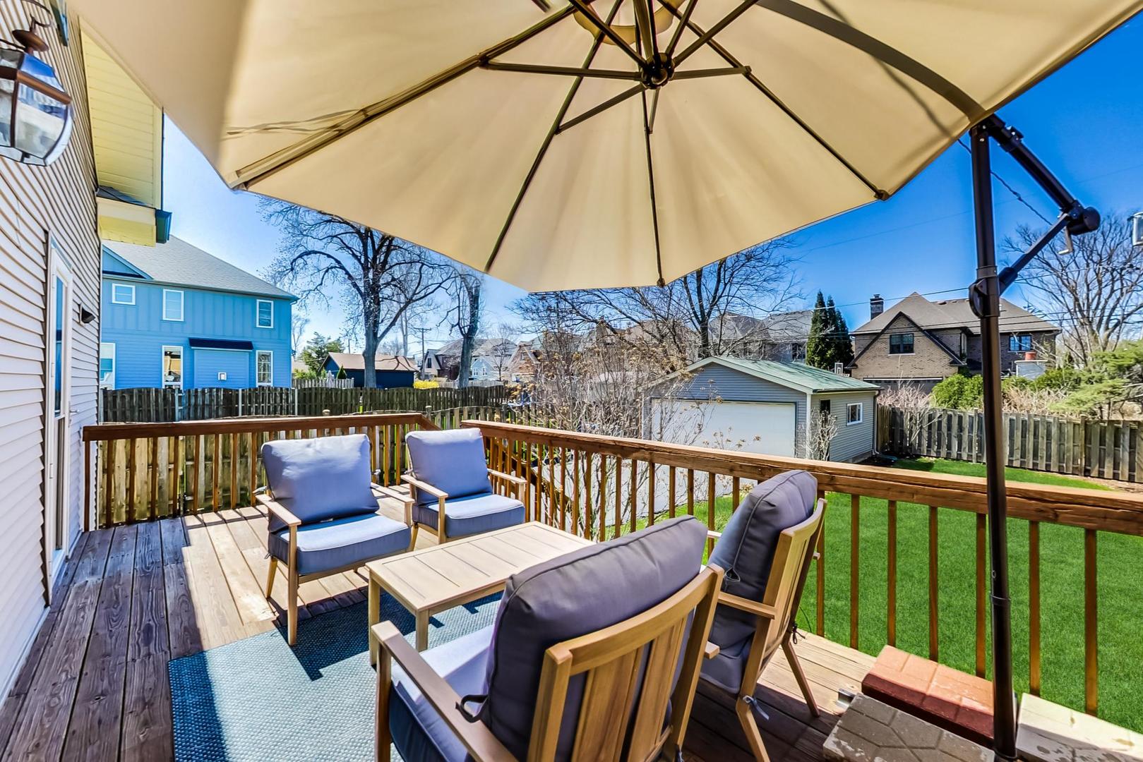 272 North Willow Road Elmhurst, IL 60126 - Photo 28 of 33 a view of balcony with furniture and umbrella