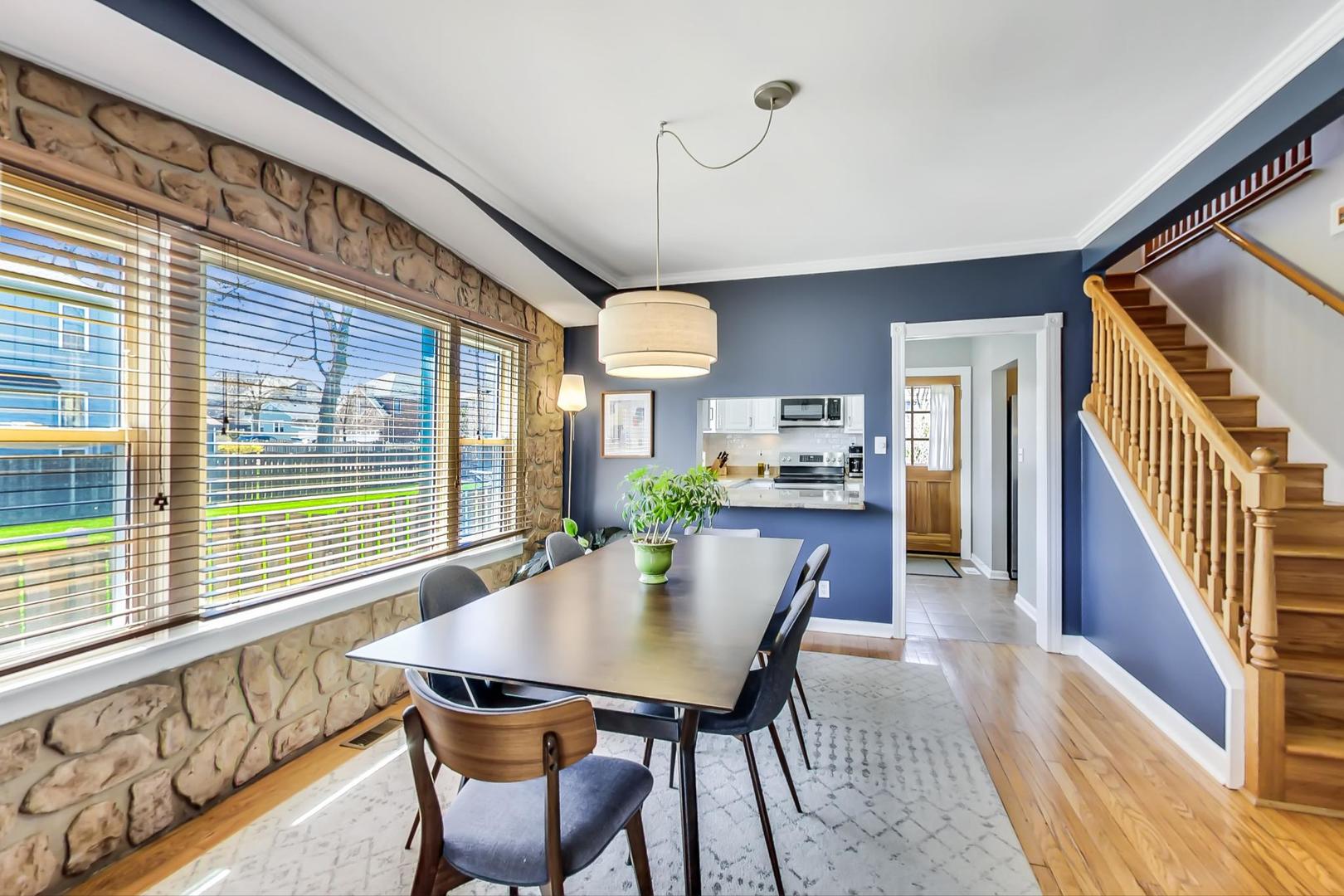 272 North Willow Road Elmhurst, IL 60126 - Photo 7 of 33 a view of a dining room with furniture window and wooden floor