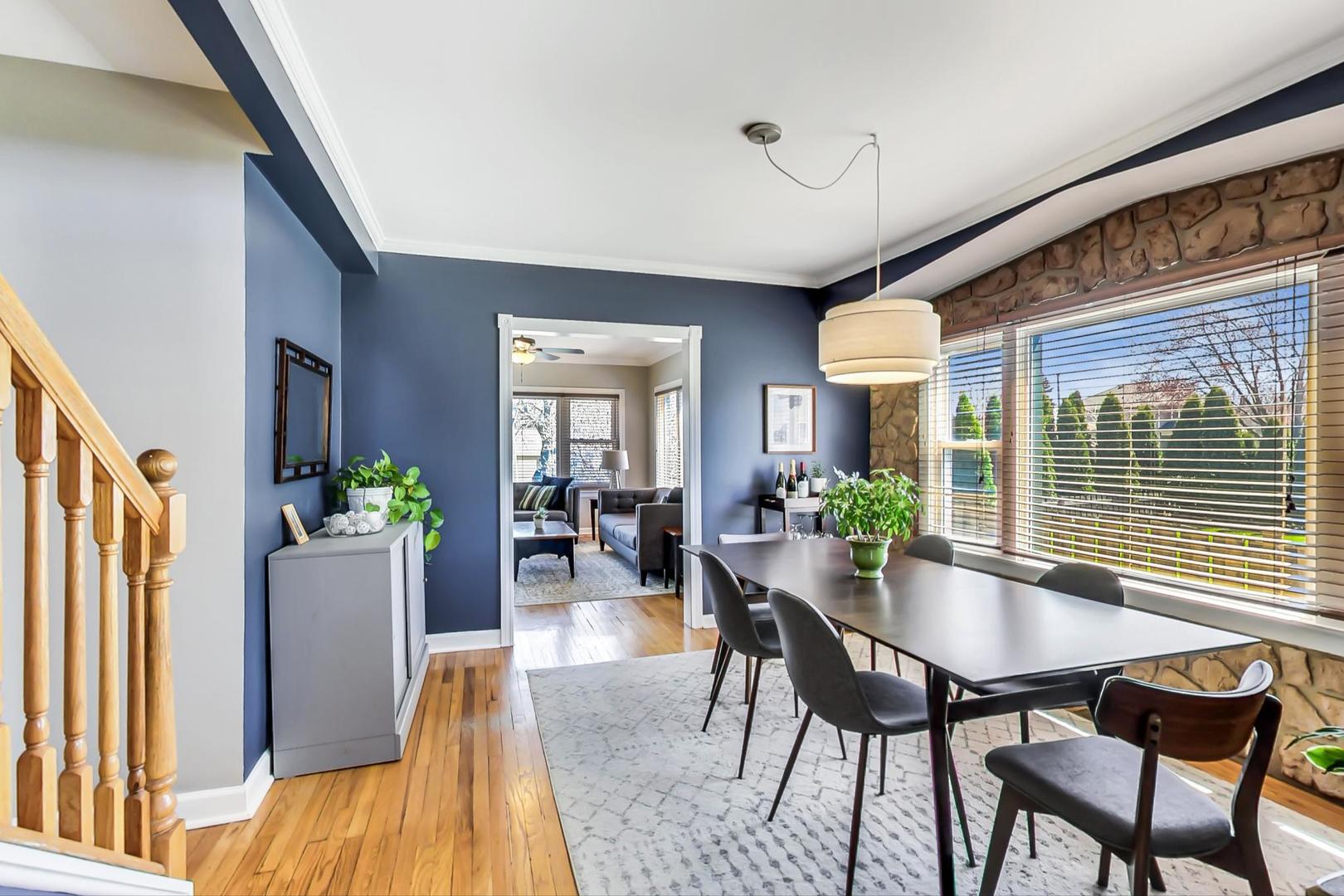 272 North Willow Road Elmhurst, IL 60126 - Photo 8 of 33 a dining room with furniture and wooden floor