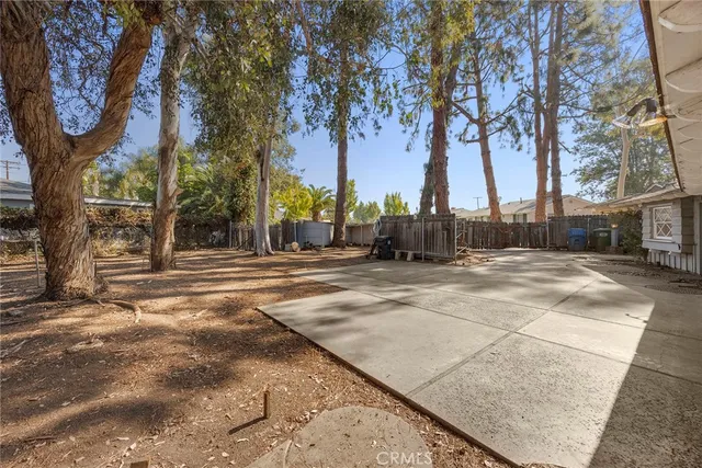 a view of empty room with wooden ceiling