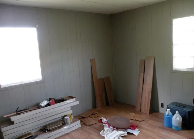 a room with toys and wooden floor