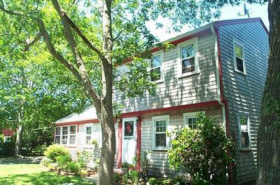 38 Bumpus Road Hyannis, MA 02601 - Photo 3 of 4 a front view of a house with garden