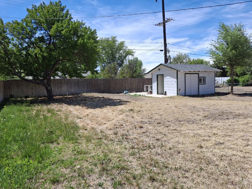 214 3rd Street Fowler, CO 81039 - Photo 13 of 15 a view of a house with a yard