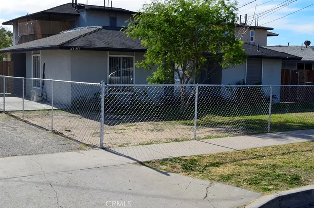 a house view with a garden space