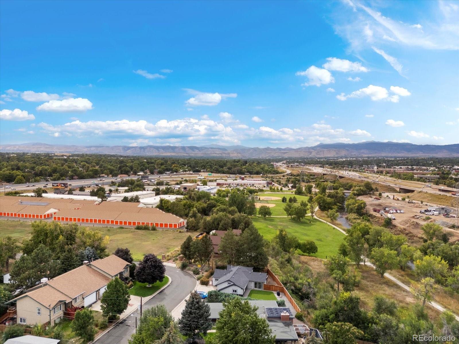 4963 North Harlan Street Wheat Ridge, CO 80033 - Photo 41 of 42 an aerial view of residential building with outdoor space