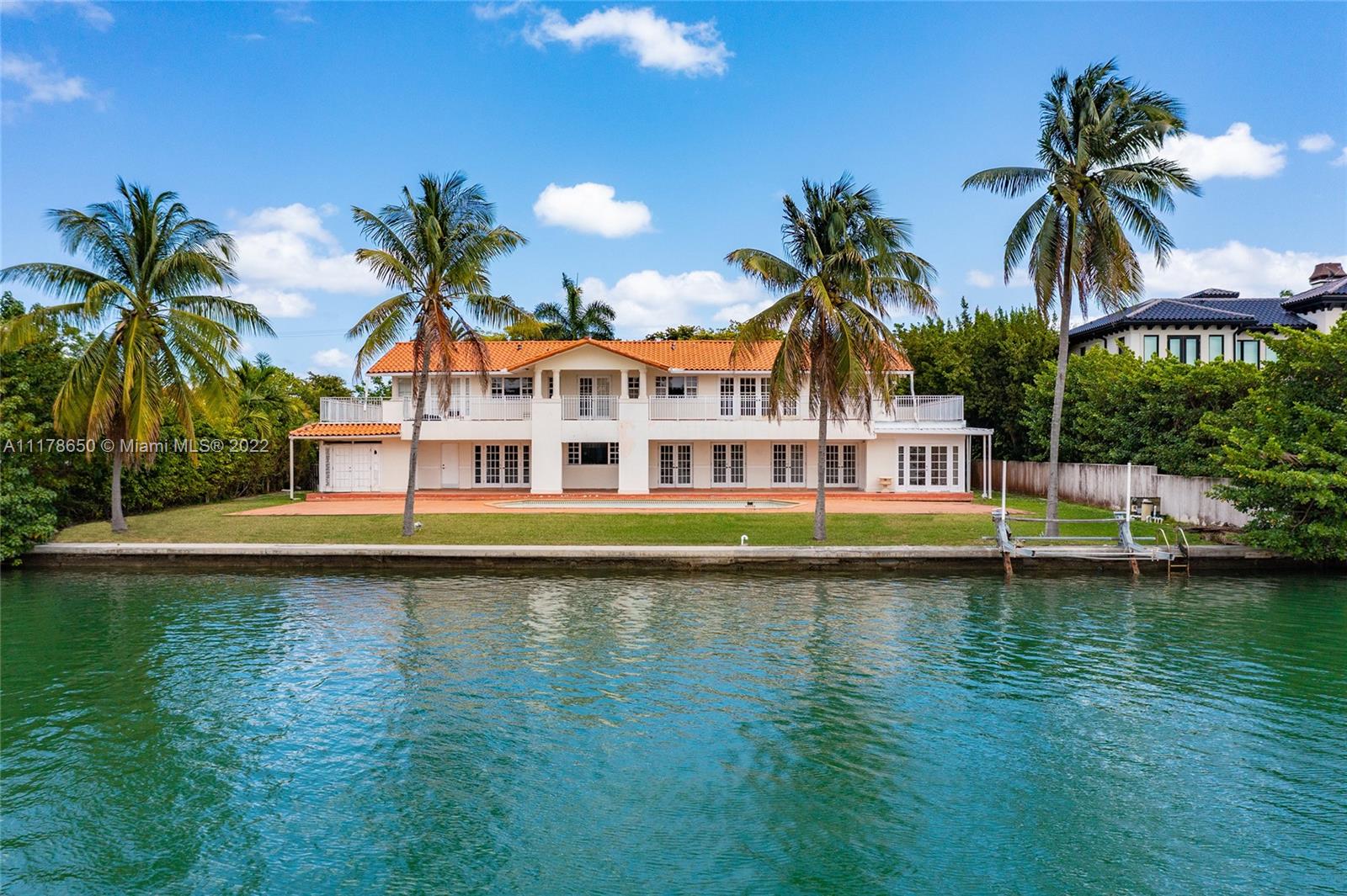 2220 North Bay Road Miami Beach, FL 33140 - Photo 5 of 9 a house with swimming pool in front of it