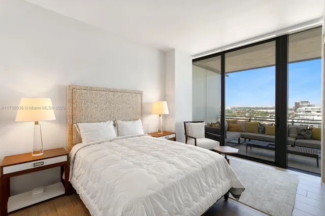 a kitchen with a sink and a stove top oven