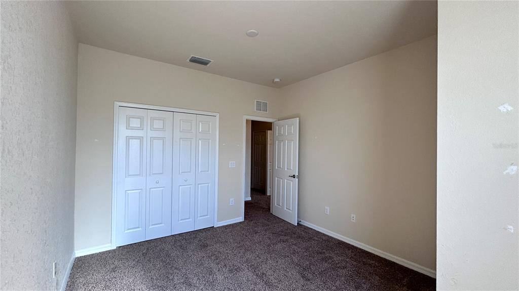 7287 Ketch Place Bradenton, FL 34212 - Photo 20 of 29 a view of an empty room