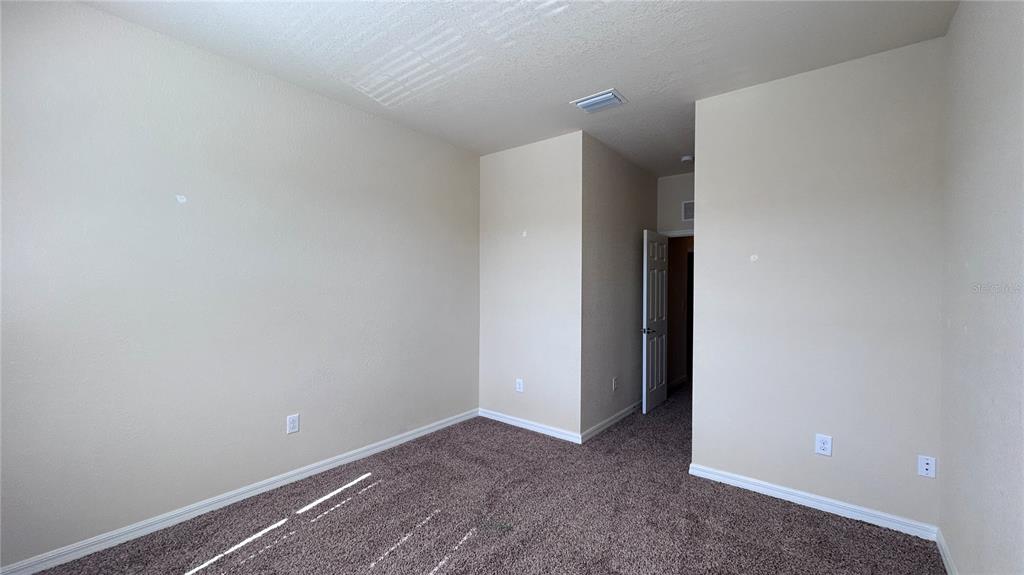 7287 Ketch Place Bradenton, FL 34212 - Photo 21 of 29 a view of an empty room