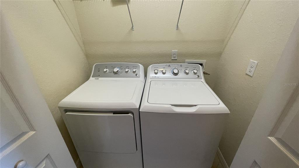 7287 Ketch Place Bradenton, FL 34212 - Photo 24 of 29 a utility room with dryer and washer
