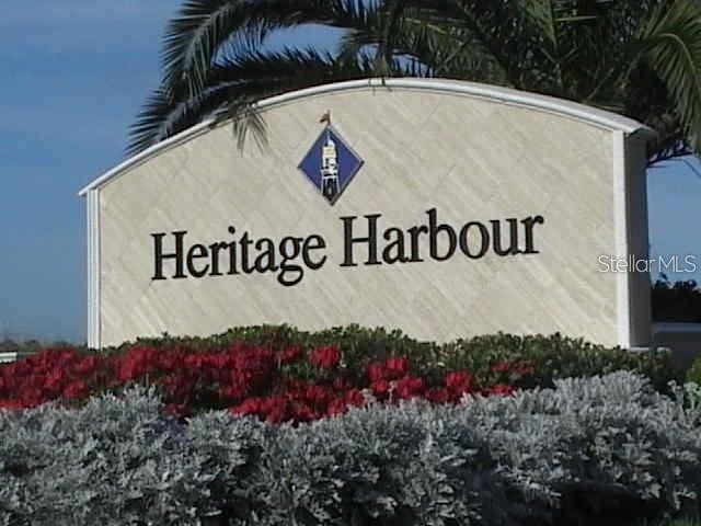 7287 Ketch Place Bradenton, FL 34212 - Photo 28 of 29 a sign that is sitting on a wooden wall