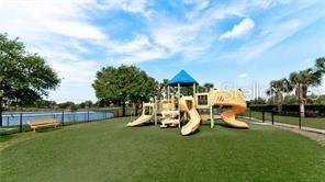 7287 Ketch Place Bradenton, FL 34212 - Photo 29 of 29 a view of a park with swings and slides