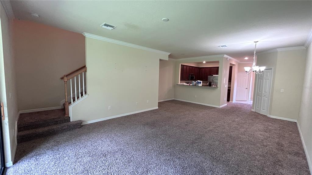 7287 Ketch Place Bradenton, FL 34212 - Photo 10 of 29 a view of a livingroom with a staircase