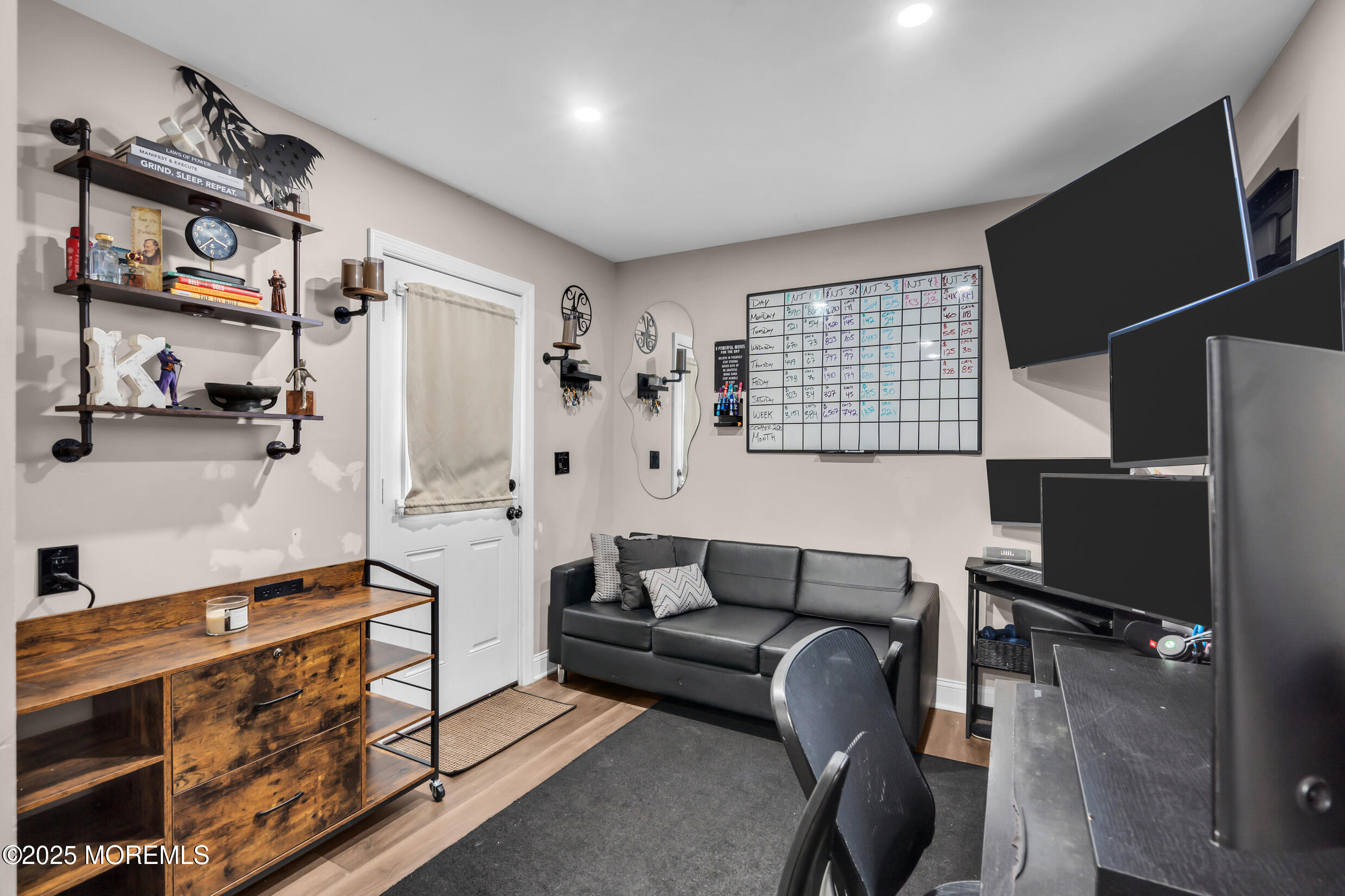 5 Sloop Court Barnegat, NJ 08005 - Photo 14 of 29 a living room with furniture and a flat screen tv
