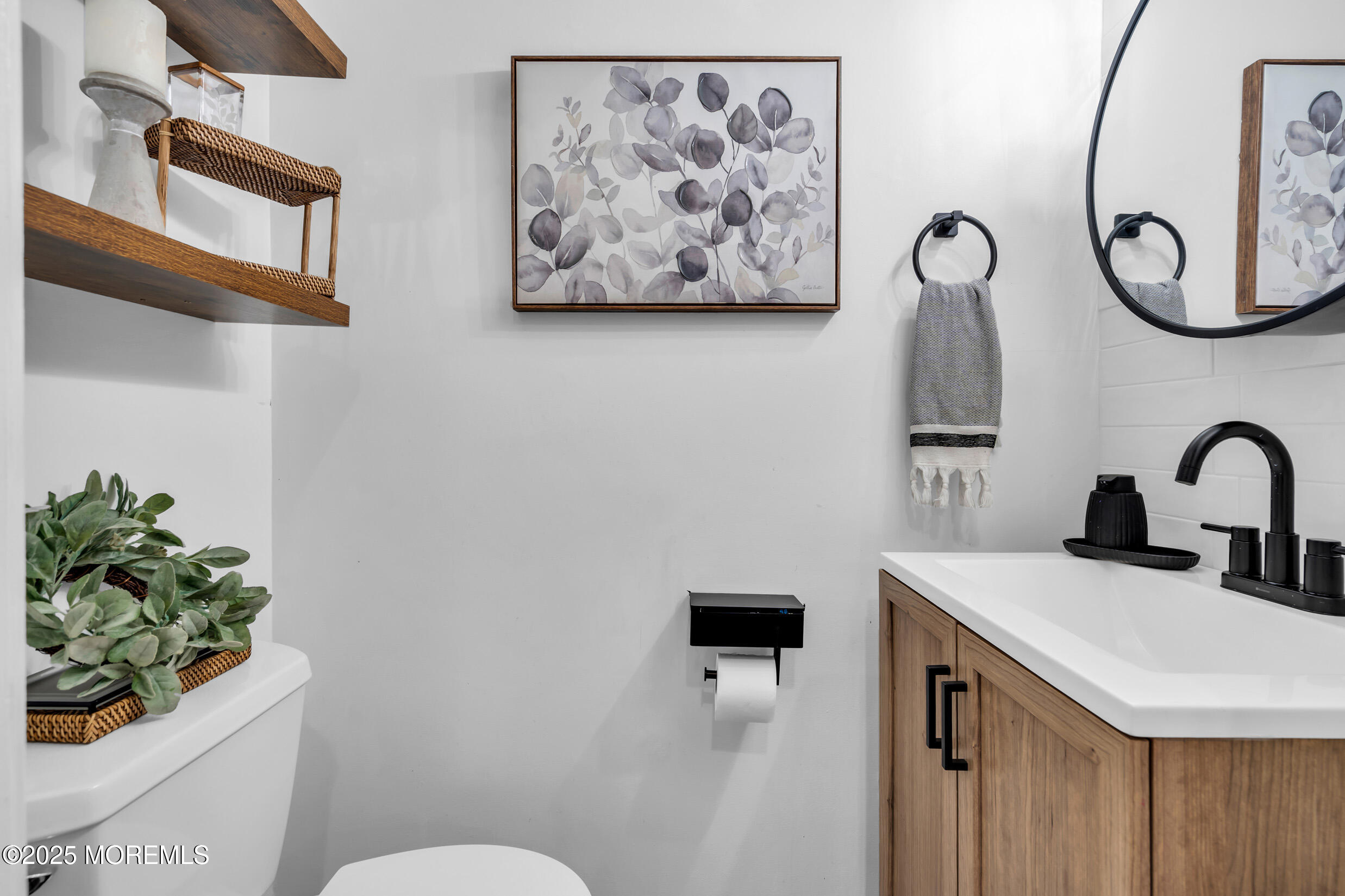 5 Sloop Court Barnegat, NJ 08005 - Photo 16 of 29 a bathroom with a sink mirror and toilet
