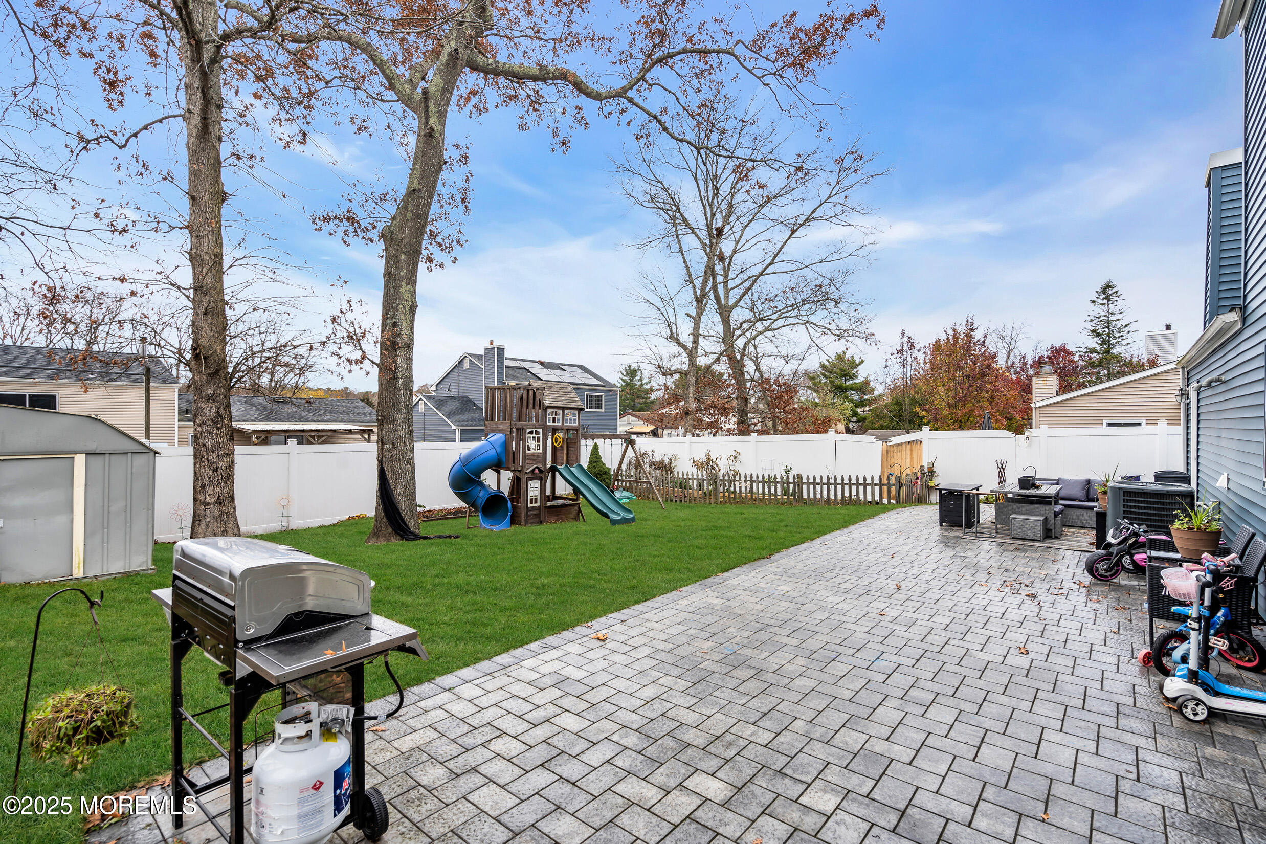 5 Sloop Court Barnegat, NJ 08005 - Photo 26 of 29 a view of a backyard with furniture