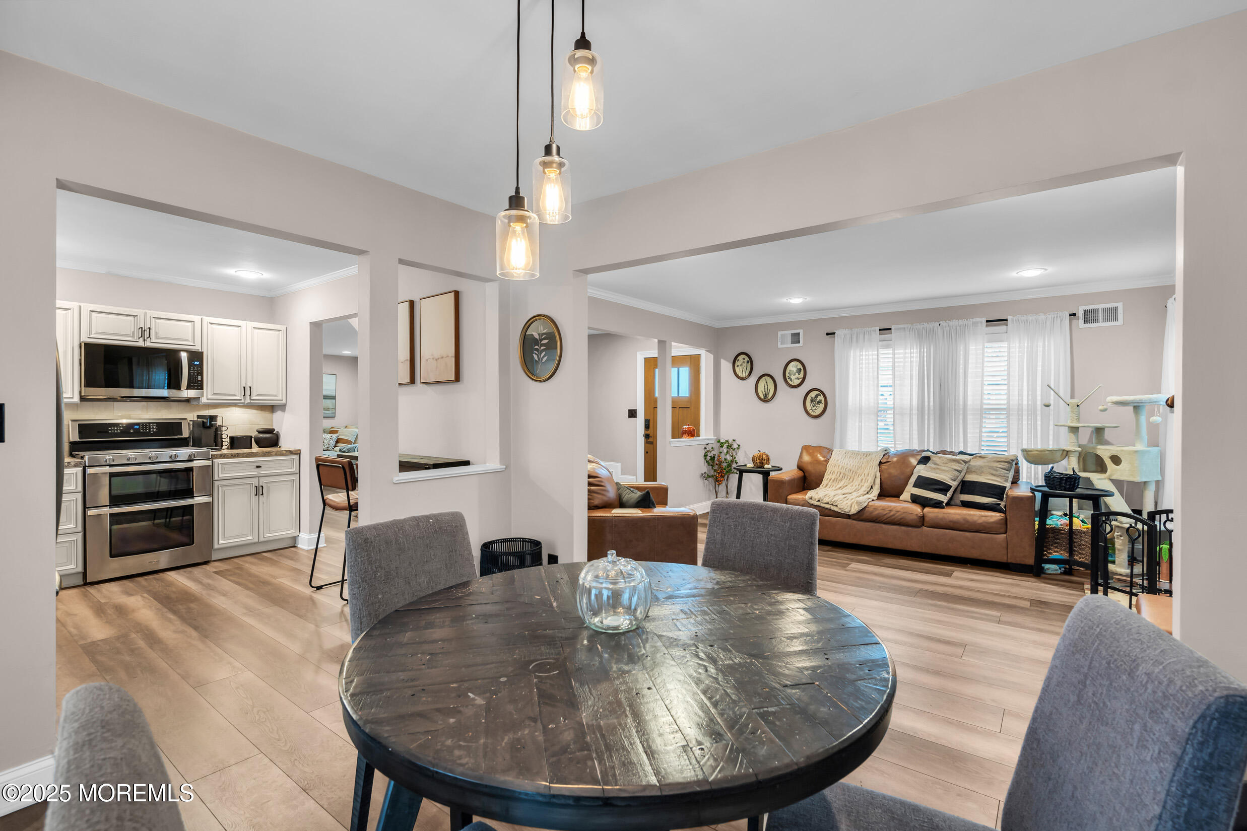 5 Sloop Court Barnegat, NJ 08005 - Photo 10 of 29 a living room with furniture kitchen view and a wooden floor