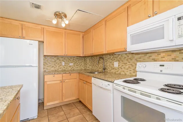 an empty room with fireplace