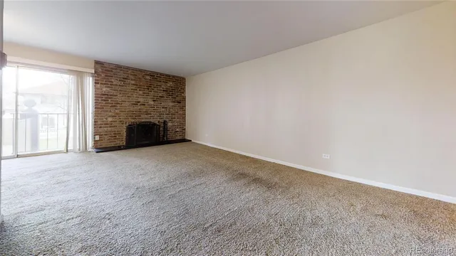 a view of a room with white walls