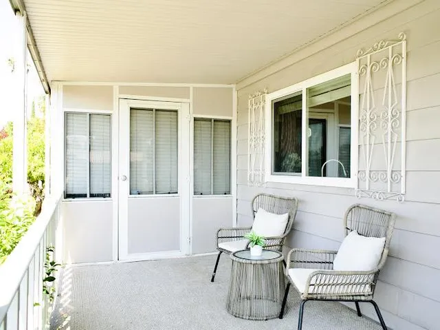 a view of chair and table in the house