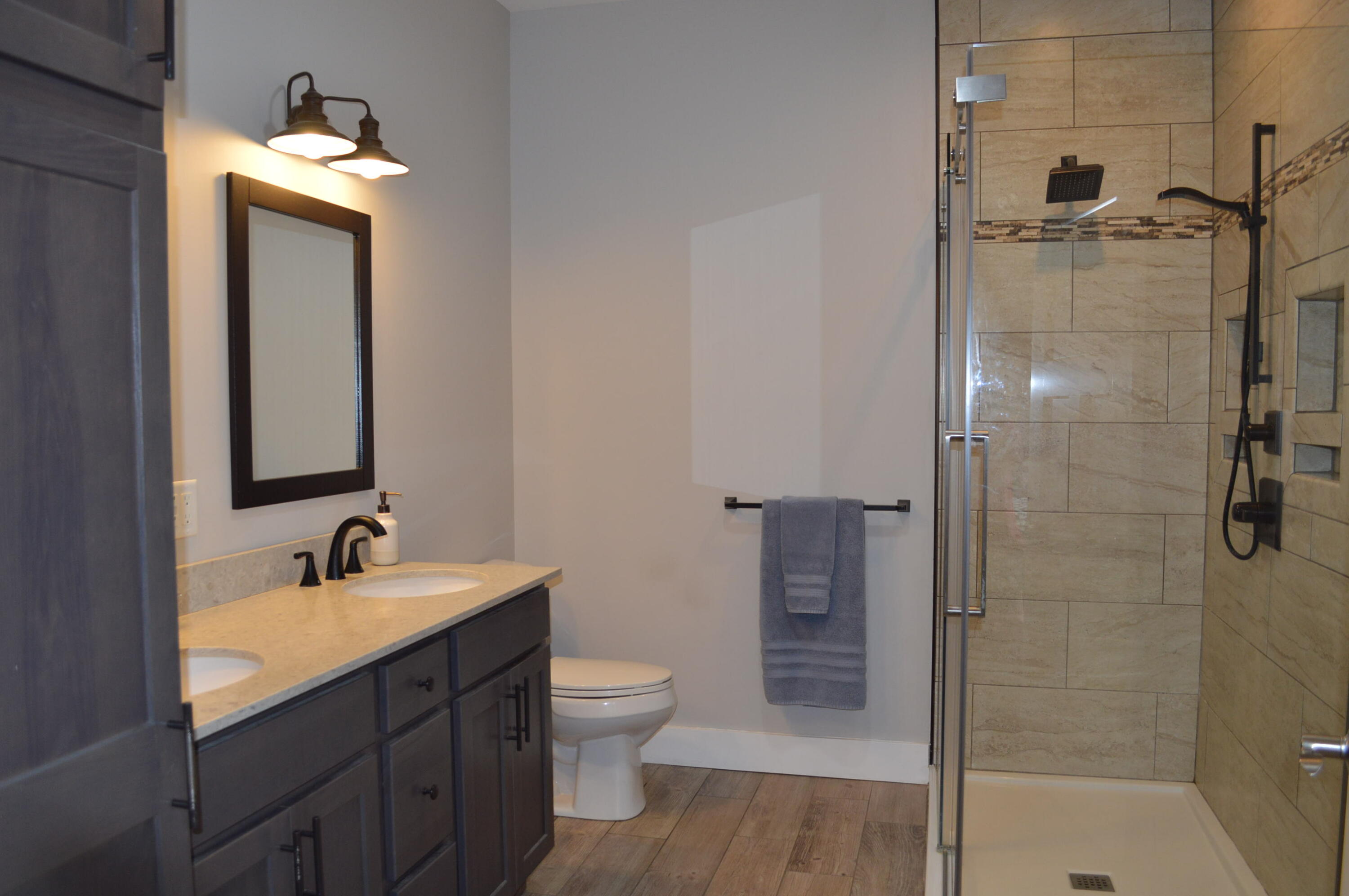 145 Village Road Fort Kent, ME 04743 - Photo 31 of 32 Primary suite with double vanity