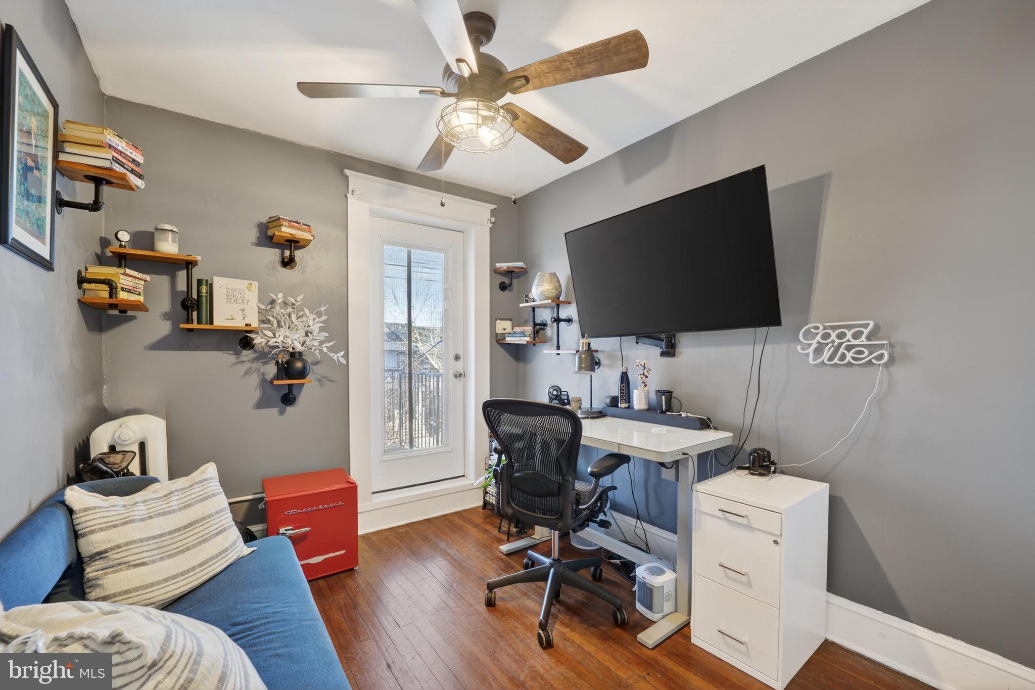 4301 4th Street Northwest Washington, DC 20011 - Photo 34 of 64 a work room with furniture and a flat screen tv