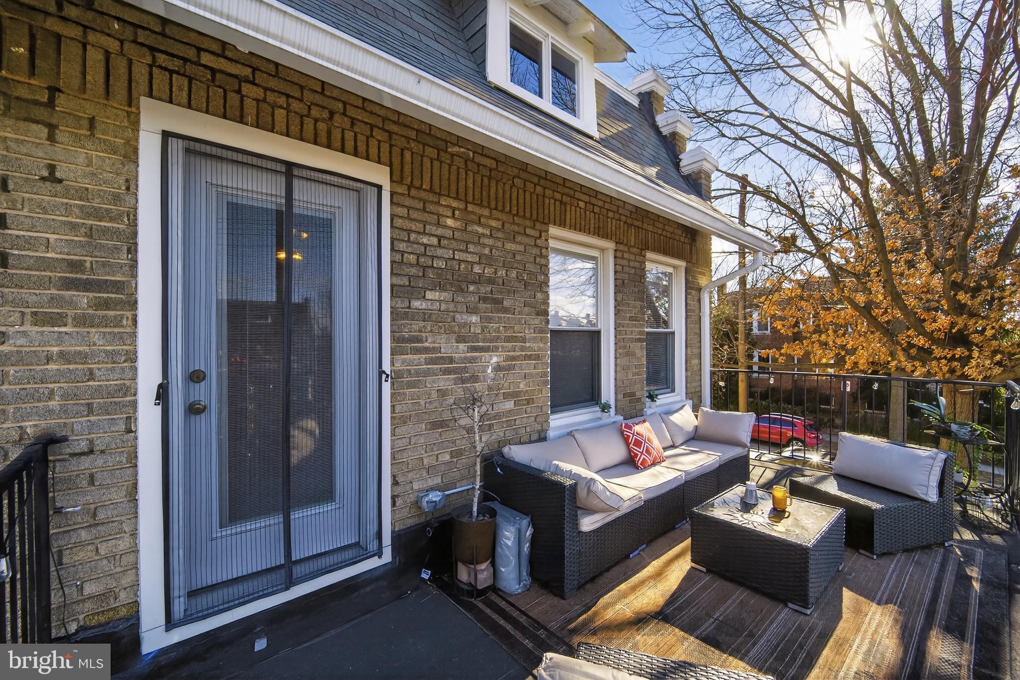 4301 4th Street Northwest Washington, DC 20011 - Photo 37 of 64 a outdoor living space with patio furniture and a potted plant
