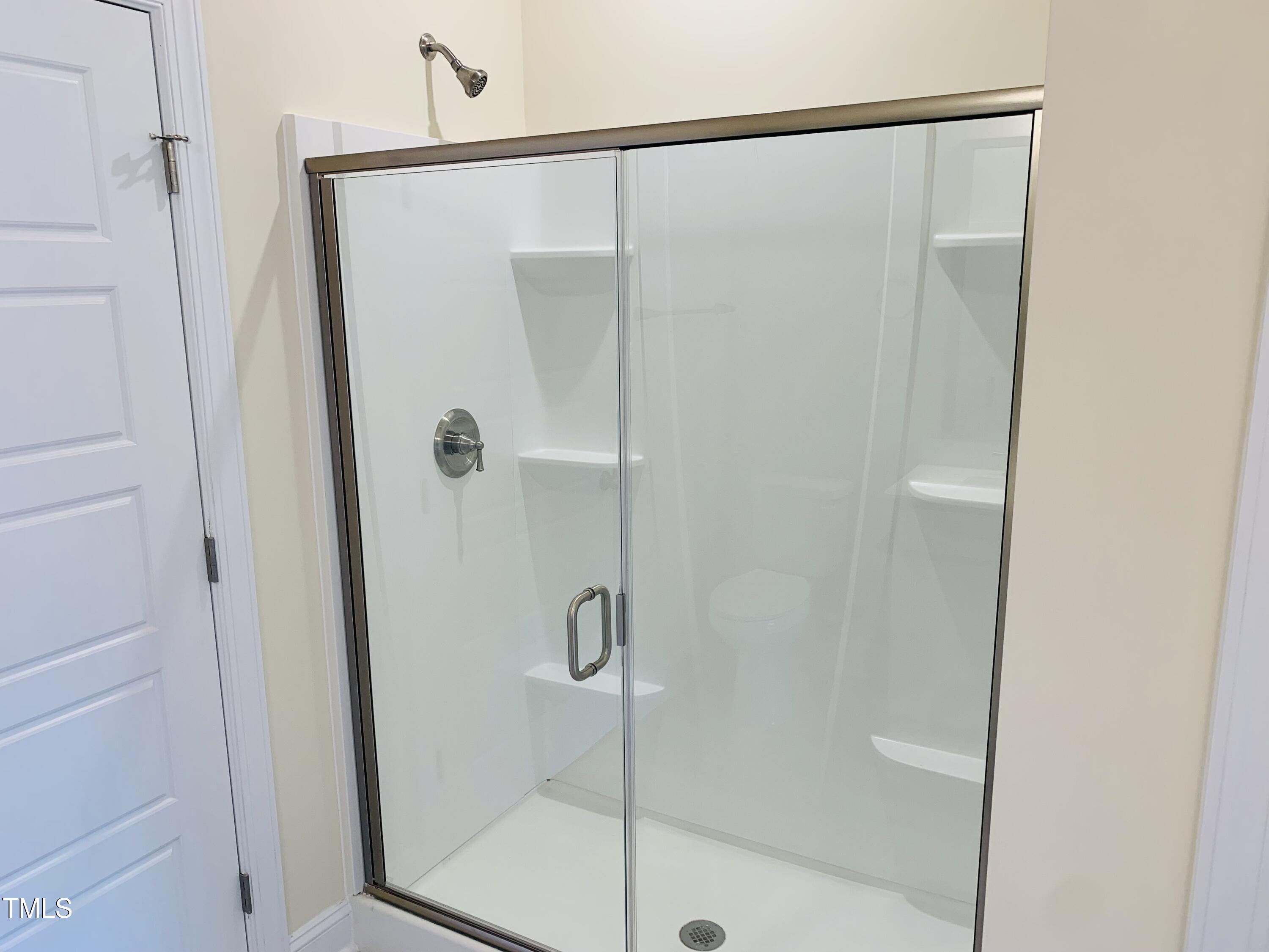 403 Weather Ridge Lane, Unit 42 Cary, NC 27513 - Photo 11 of 17 {WCC 403 Primary Bath Shower