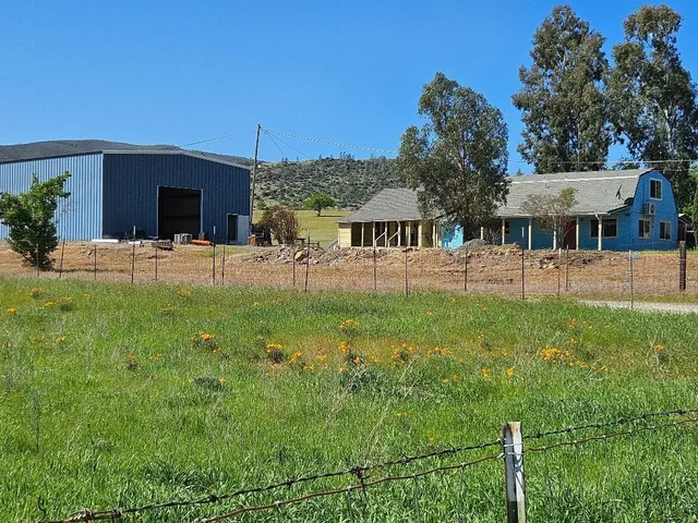 a house view with a garden space