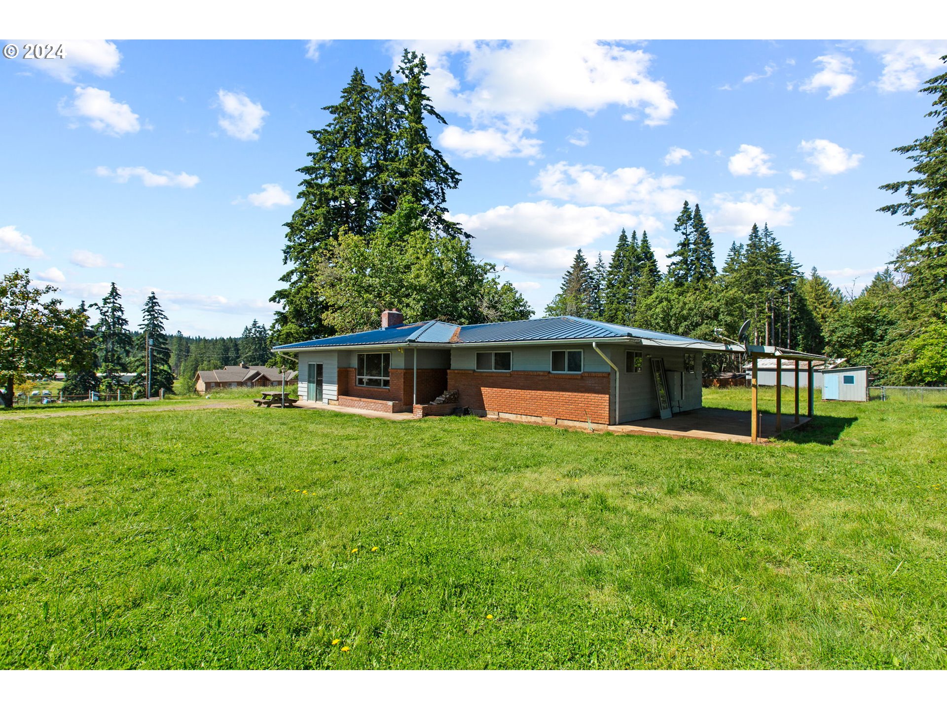 30806 South Oswalt Road Colton, OR 97017 - Photo 1 of 42 a front view of a house with a yard