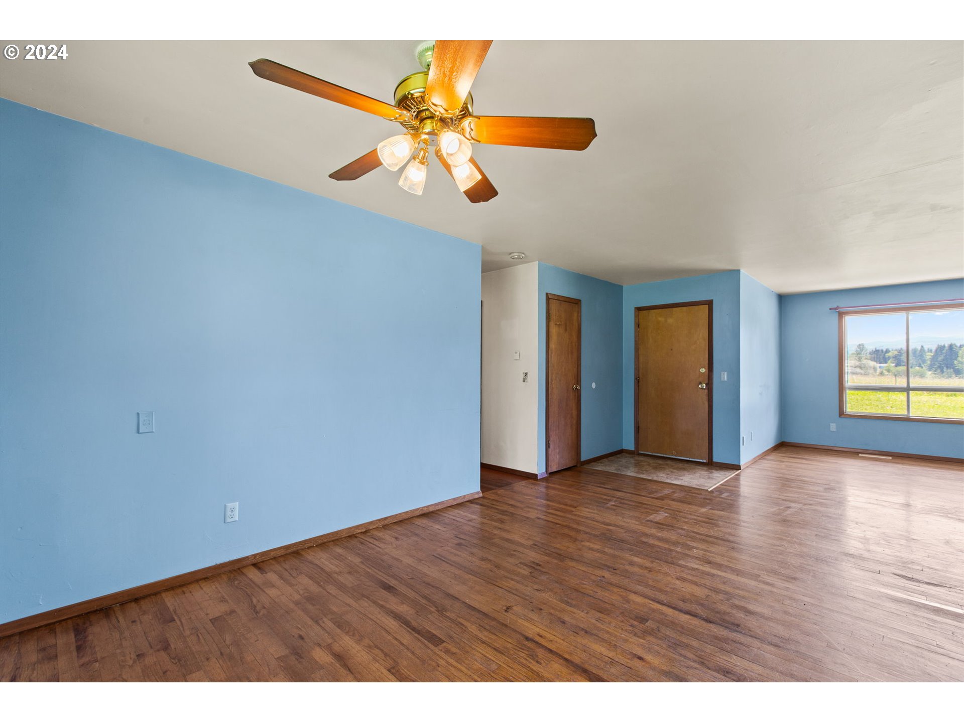 30806 South Oswalt Road Colton, OR 97017 - Photo 12 of 42 a view of an empty room with wooden floor