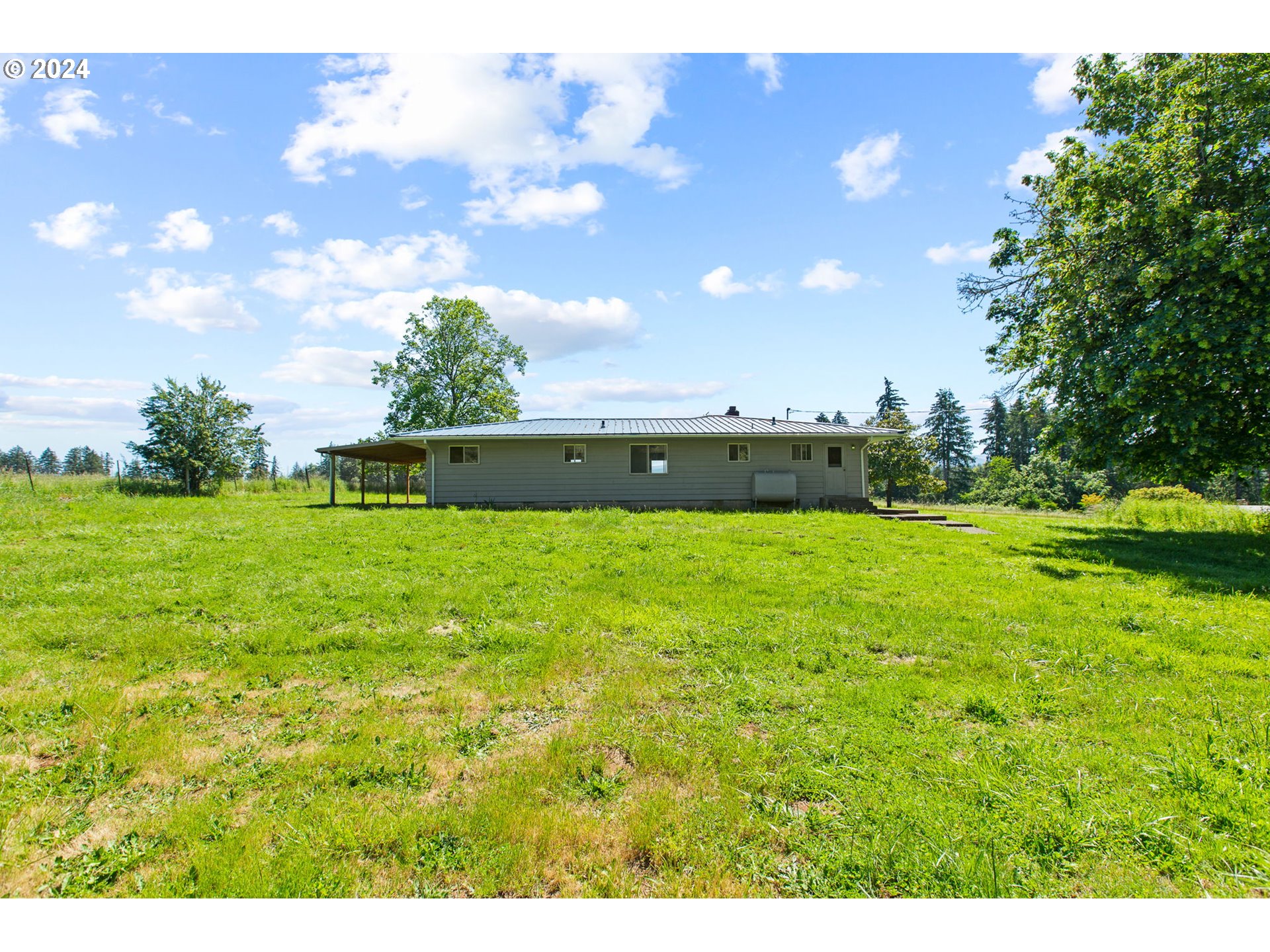 30806 South Oswalt Road Colton, OR 97017 - Photo 33 of 42 a view of yard with swimming pool and green space