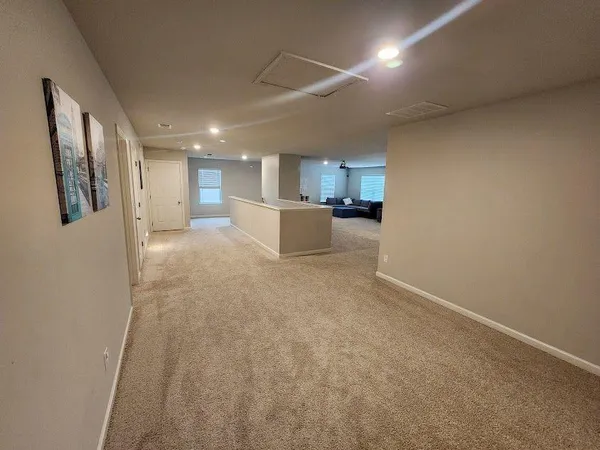 a living room with furniture and a couch