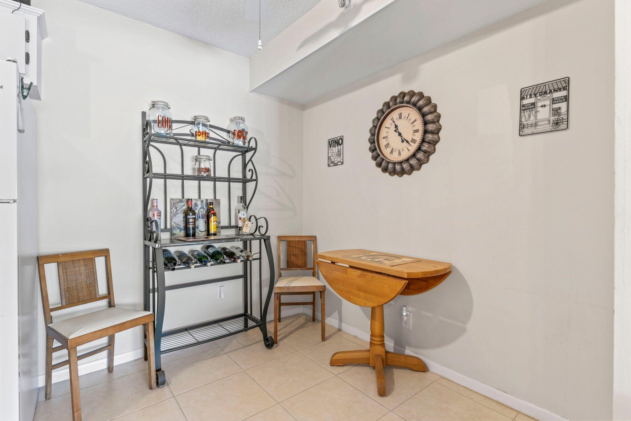 2732 Southwest Matheson Avenue, Unit 112B2 Palm City, FL 34990 - Photo 11 of 28 Kitchen/Dining Area