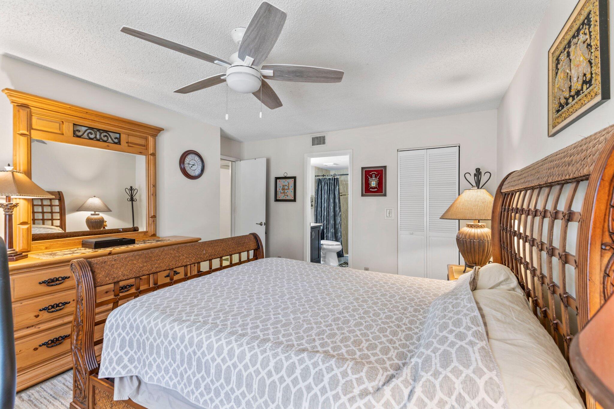 2732 Southwest Matheson Avenue, Unit 112B2 Palm City, FL 34990 - Photo 13 of 28 Primary Bedroom