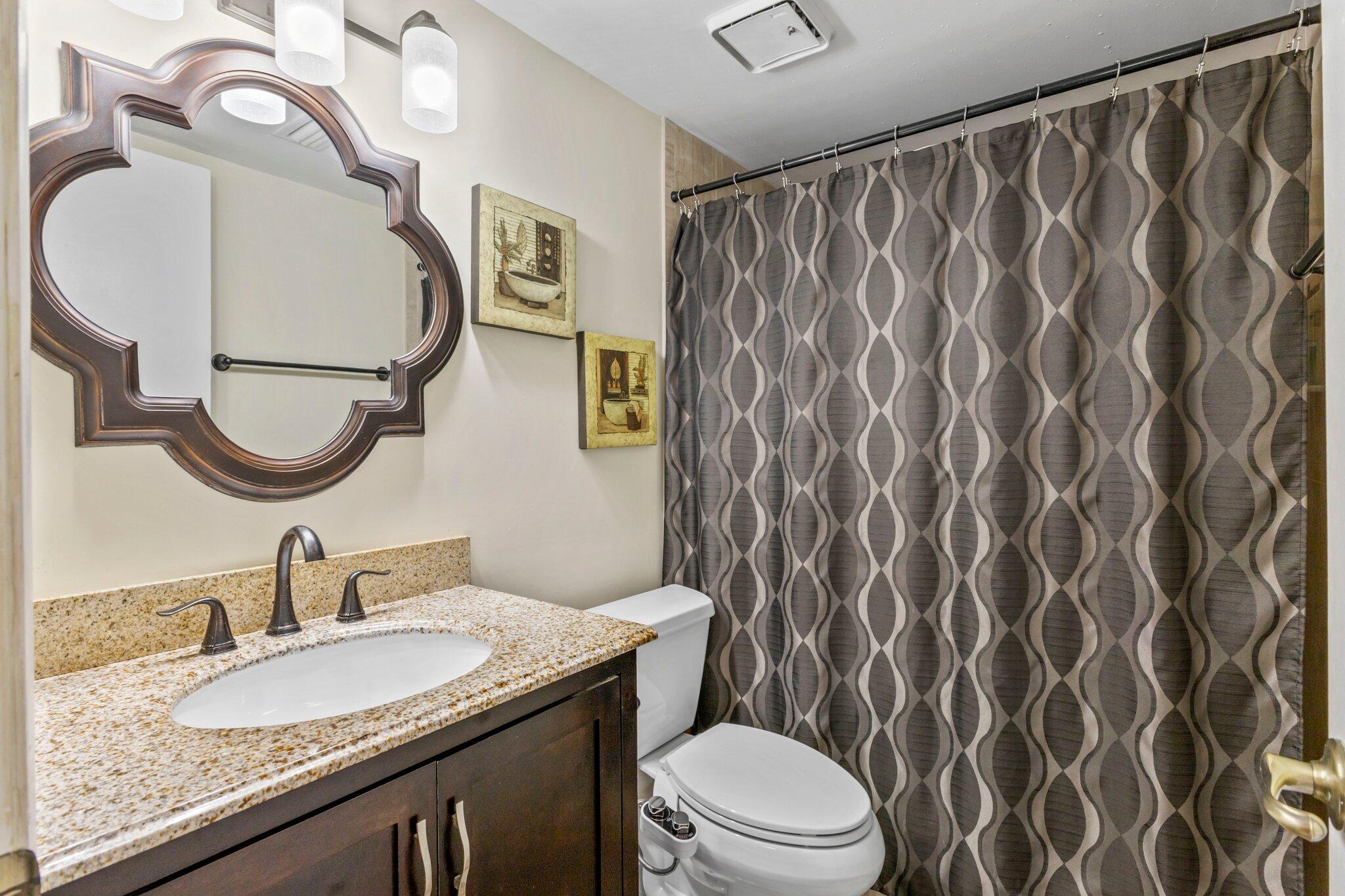 2732 Southwest Matheson Avenue, Unit 112B2 Palm City, FL 34990 - Photo 14 of 28 Primary Bathroom