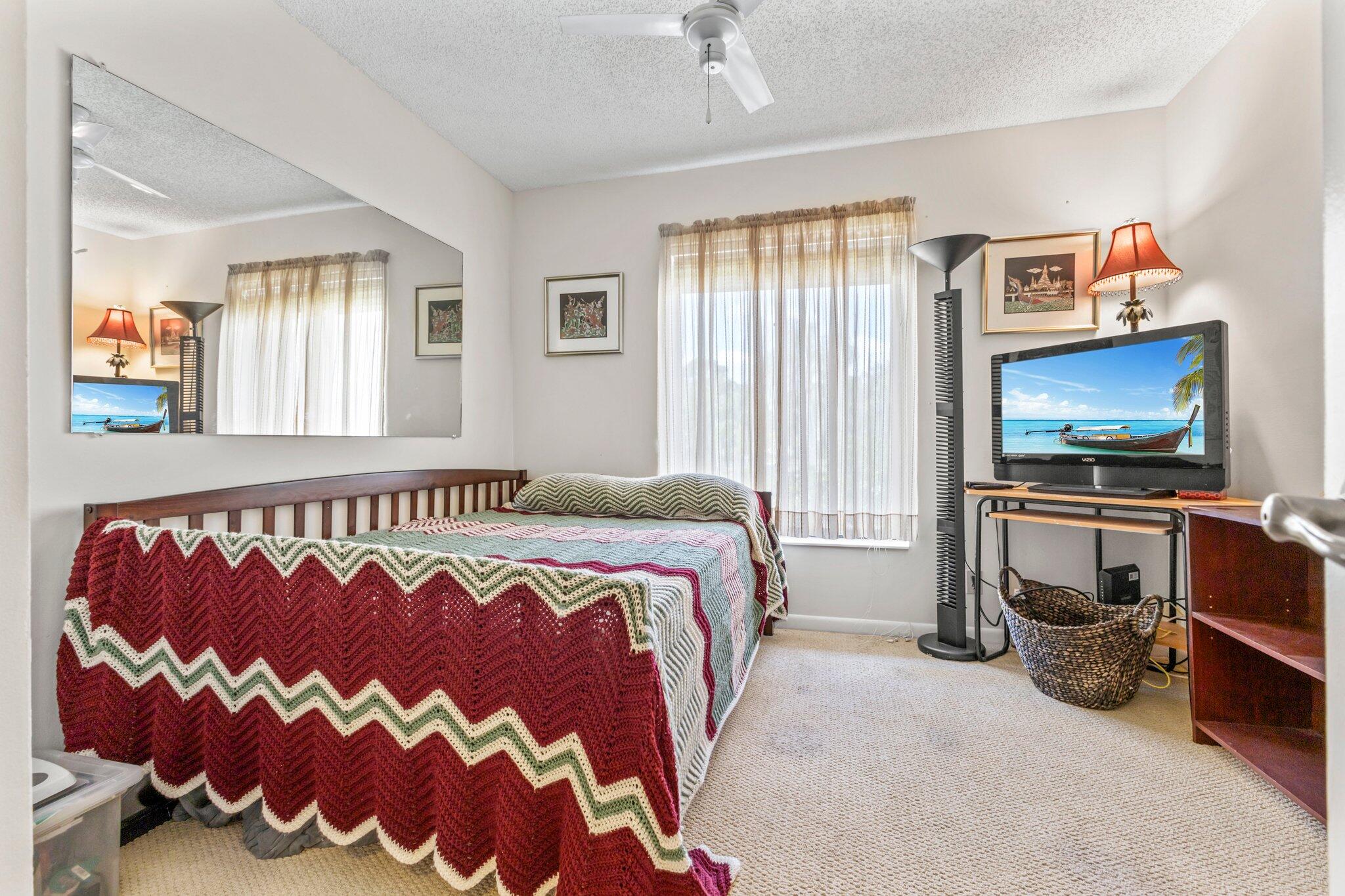 2732 Southwest Matheson Avenue, Unit 112B2 Palm City, FL 34990 - Photo 15 of 28 Secondary Bedroom