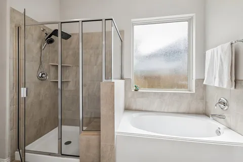 a bathroom with a double vanity sink mirror and double