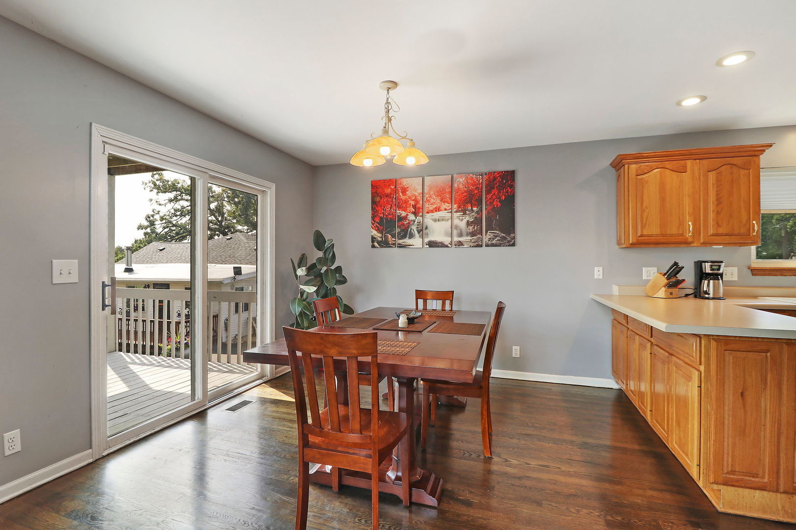 39 Rushmore Road Fox Lake, IL 60020 - Photo 11 of 38 a dining room with furniture a chandelier and wooden floor