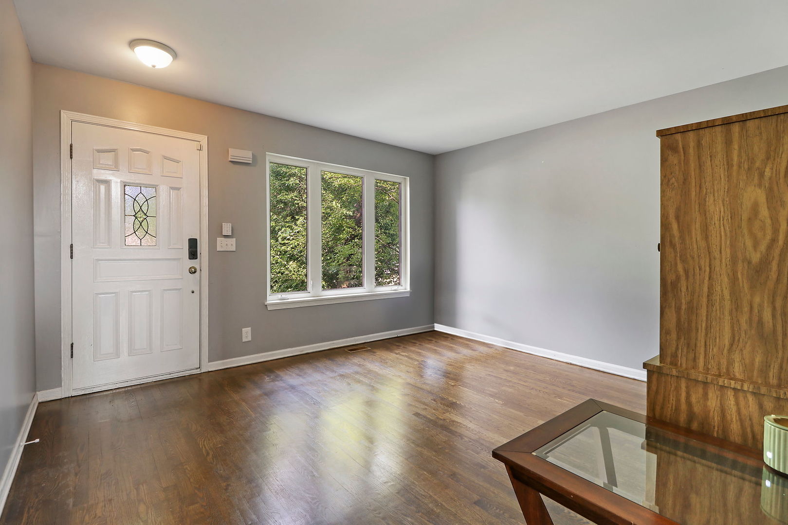 39 Rushmore Road Fox Lake, IL 60020 - Photo 14 of 38 an empty room with wooden floor and windows