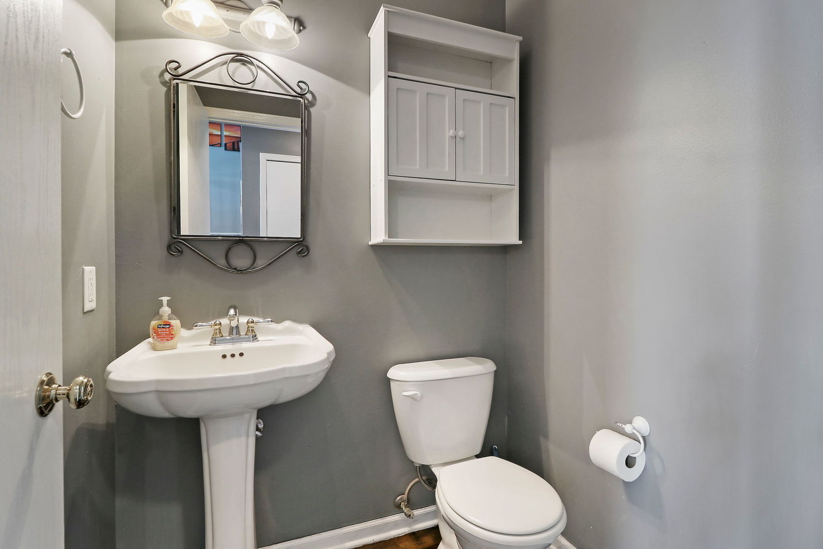 39 Rushmore Road Fox Lake, IL 60020 - Photo 15 of 38 a bathroom with a toilet sink and mirror