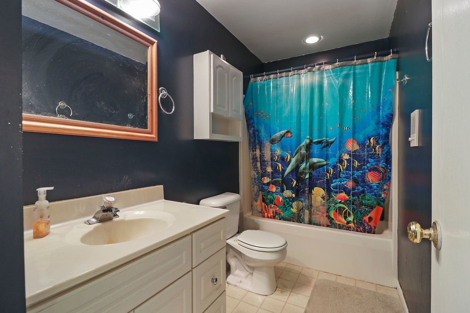 39 Rushmore Road Fox Lake, IL 60020 - Photo 26 of 38 a bathroom with a toilet sink and mirror