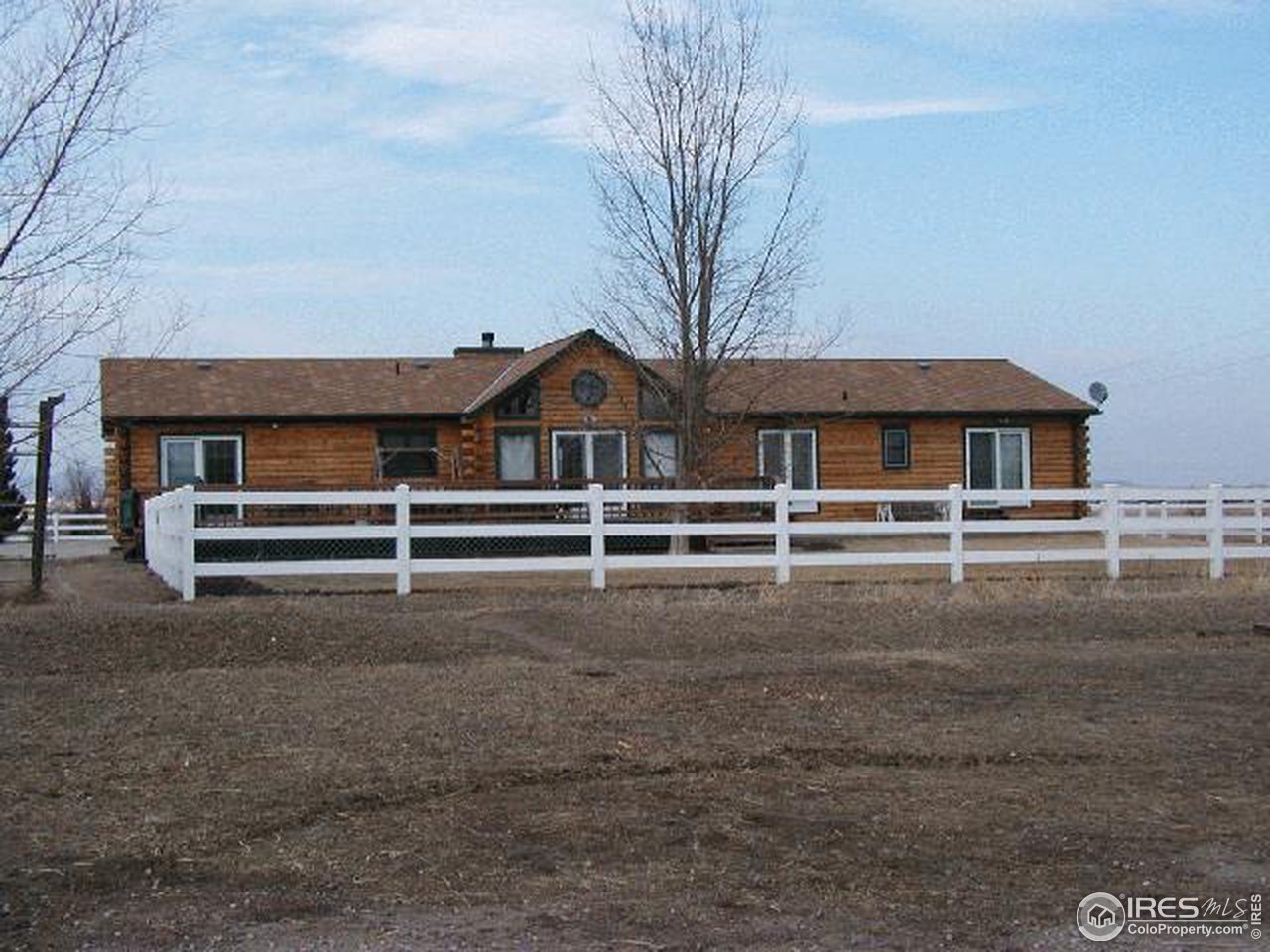 5150 St Vrain Road Longmont, CO 80503 - Photo 9 of 11 a front view of a house with a yard