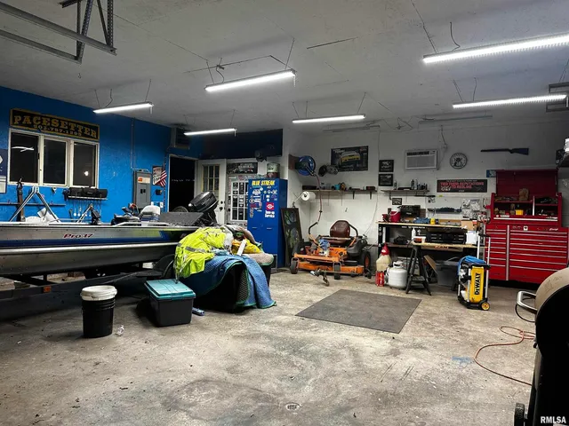a garage with table and chairs