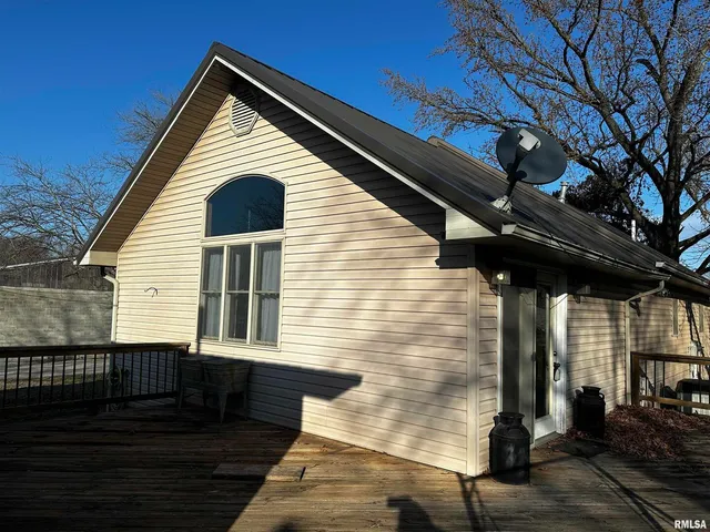 a view of a house with a roof deck