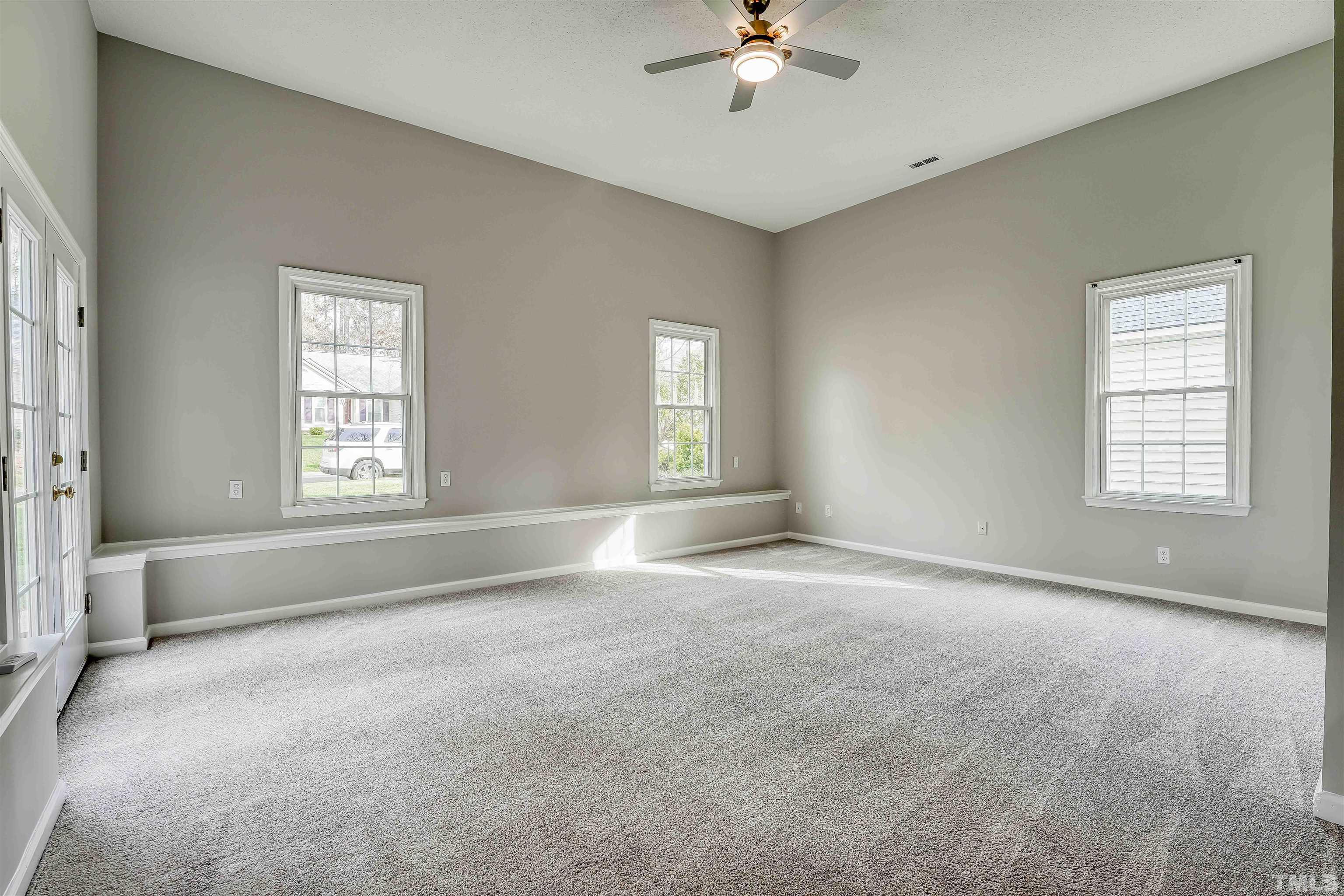 5516 Bridford Place Raleigh, NC 27613 - Photo 11 of 20 a view of an empty room with a window