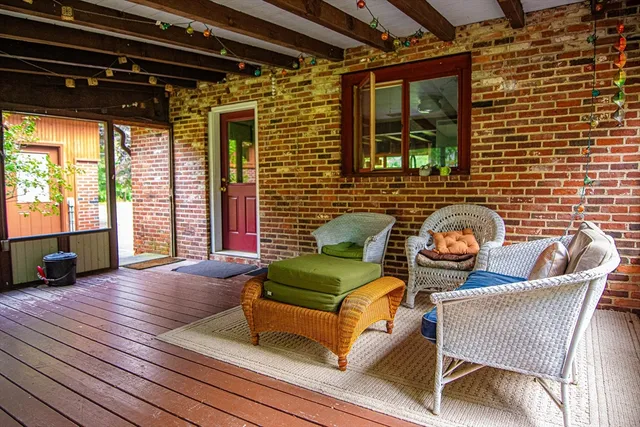 a outdoor living space with furniture and a window