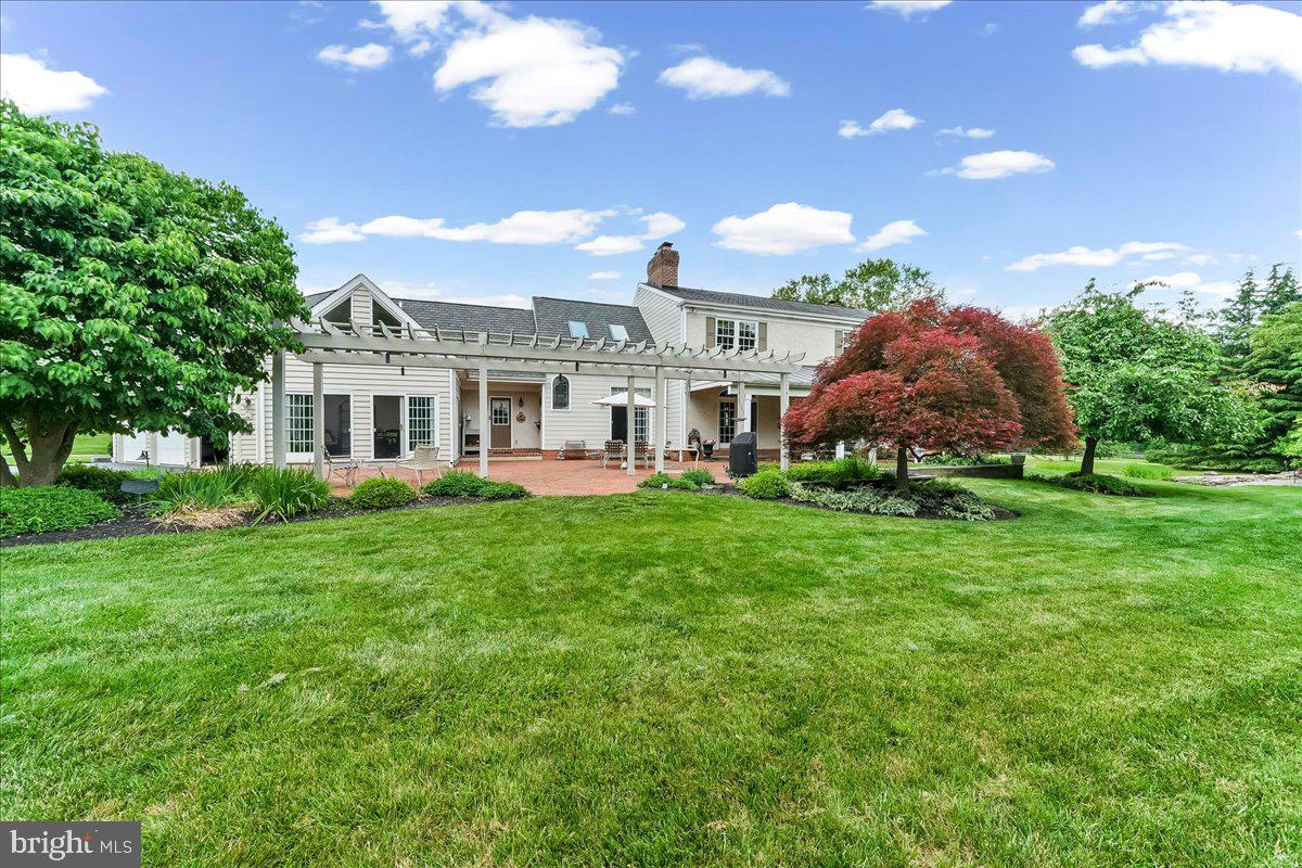 7 Bolingbroke Road West Chester, PA 19382 - Photo 68 of 86 Charming home with lush green landscape.